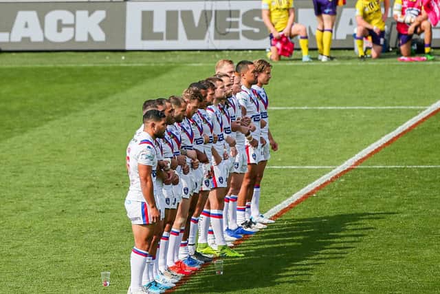Trinity's players line up before kick-off against Wigan. Picture by Alex Whitehead/SWpix.com.