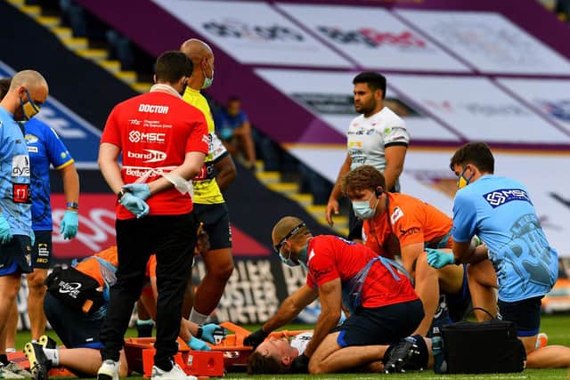 James Donaldson is treated after being injured against Huddersfield earlier this month. Picture by James Hardisty.