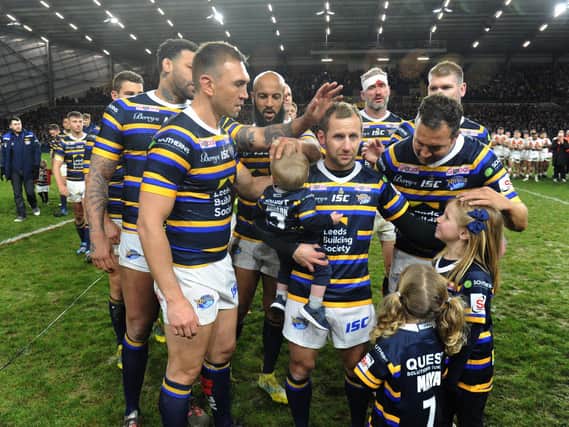 Rob Burrow, centre, after Jamie Jones-Buchanan's testimonial game earlier this year, which raised money for his fight against MND. Picture by Steve Riding.