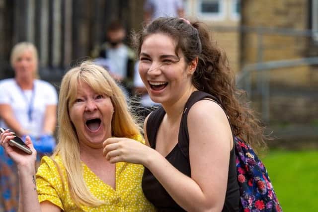 Lexi Crossley celebrates her results with mum Karen after getting an A* and two As at The Crossley Heath School, Halifax. Picture: Bruce Rollinson