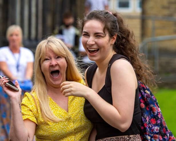 Lexi Crossley celebrates her results with mum Karen after getting an A*  and two As at The Crossley Heath School, Halifax. Picture: Bruce Rollinson