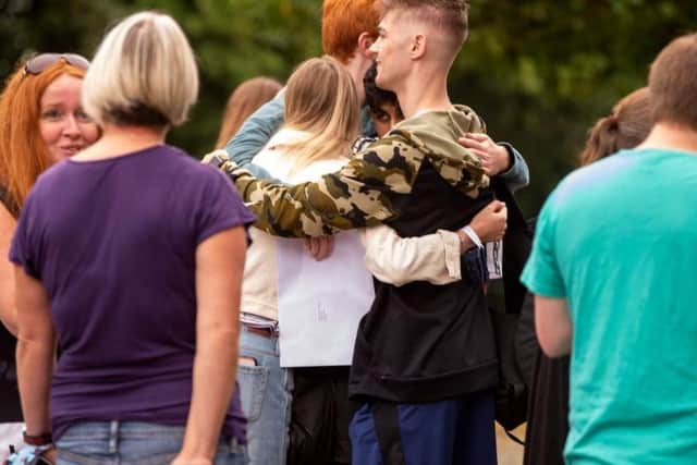 Pupils collect their A-level Results at The Crossley Heath School, Halifax. Picture: Bruce Rollinson.