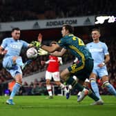 WELL SUITED: Jack Harrison is closed down by Arsenal goalkeeper Emiliano Martinez as the Whites pour forward in January's FA Cup tie against their Premier League hosts. Photo by Julian Finney/Getty Images.