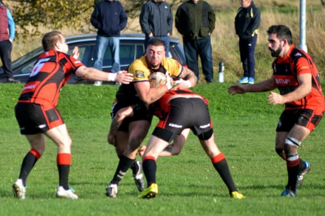 Jenson Okhovat playing for Drighlington in 2014.
