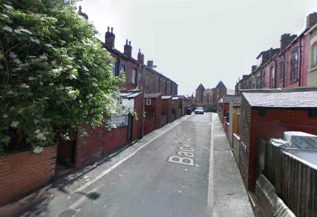 A 69-year-old woman was killed after being hit by a van on Back Athlone Grove in Armley.