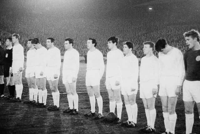 MAIDEN VOYAGE: Jack Charlton, left, leads out Leeds United for their Fairs Cup clash against Valencia. Picture by Varleys.