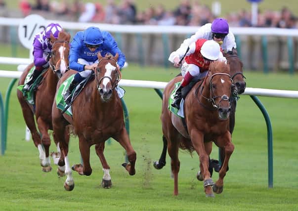 Earthlight (second left) and Mickael Barzalona winning last year's The Juddmonte Middle Park Stakes at Newmarket. Picture: Nigel French/PA Wire.