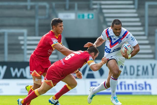 Wakefield Trinity's Bill Tupou tries to break the Catalans defence. (PIC: Bruce Rollinson/JPI Media)