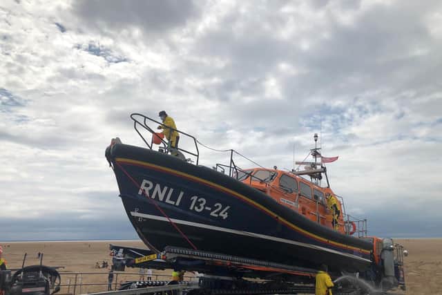 The RNLI lifeboat returns after searching for Muhammad Azhar Shabbir, 18, and Ali Athar Shabbir, 16, from Dewsbury, the two missing teenagers who got into difficulty in water at St Annes, Lancashire (photo: Kim Piling / PA Wire).