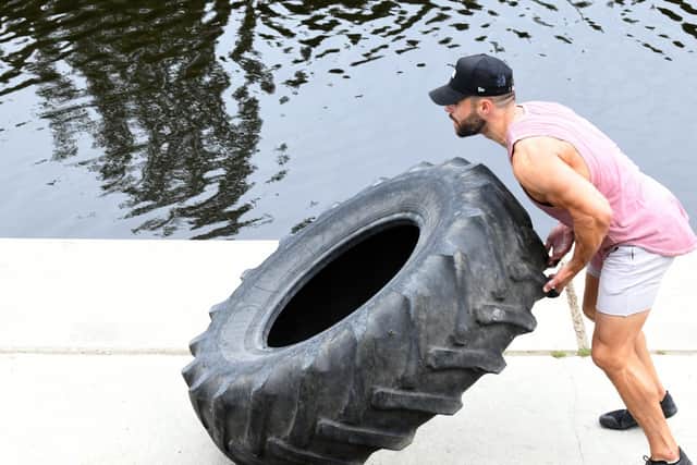 Greg Saunders, 33, from Hunslet, flipped a whopping 165lb (75kg) tyre continuously  for 24 hours to raise money for Mind.