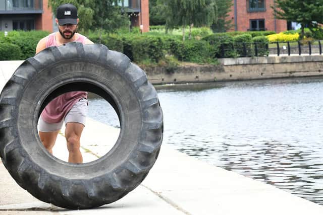 Greg Saunders, 33, from Hunslet, flipped a whopping 165lb (75kg) tyre continuously  for 24 hours to raise money for Mind.