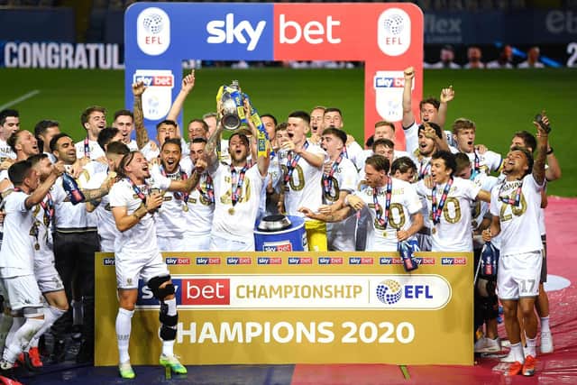 BACK IN THE BIG TIME: Leeds United celebrate promotion with the Championship trophy following their season finale 4-0 win at home to Charlton Athletic. Photo by Michael Regan/Getty Images.