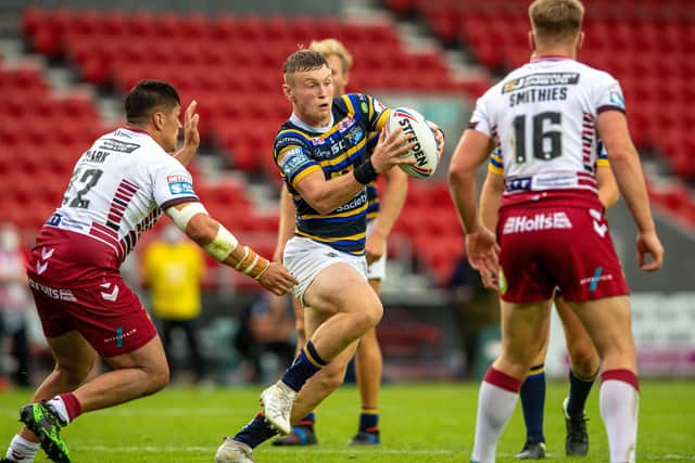 Leeds Rhinos' Harry Newman on the attack against
 Wigan. Picture: Bruce Rollinson.