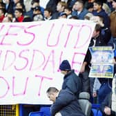 Leeds United fans hold a 'Ridsdale out' banner at Elland Road. (Getty)