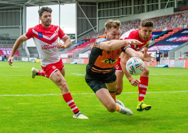 Michael Shenton narrowly fails to touch down against St Helens on Sunday. Picture: Bruce Rollinson.