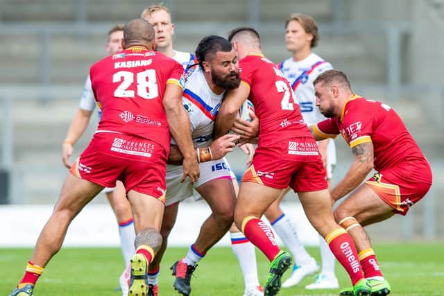 David Fifita pushes forward in 
Wakefield Trinity's disappointing defeat to Catalans Dragons.
 Picture: Bruce Rollinson.