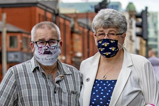 Family and friends of the Manchester bomb victims, wearing masks in support of the victims, arrive to watch the sentencing of Hashem Abedi via videolink.