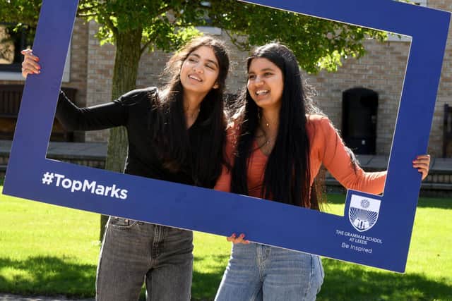 Twins, Esha (left) and Risha Gupta, celebrate their 20 GCSE results at Leeds Grammar School.