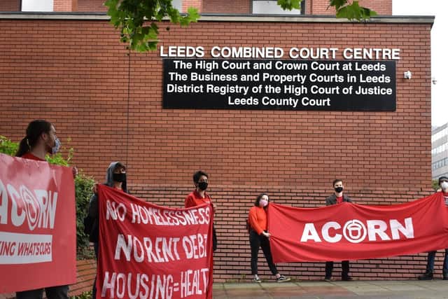 The campaigners waved red banners and chanted in support of renters who are facing eviction