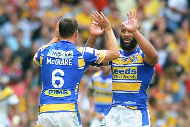 Danny McGuire is congratulated by Jamie Jones-Buchanan after his drop goal against Castleford Tigers at Wembley in 2014. Picture: Steve Riding.