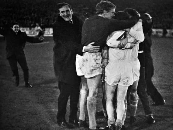DRAMATIC: Legendary former Leeds United boss Don Revie, left, celebrates with his players as the Whites progress past Fairs Cup quarter-final opponents Bologna after the flip of a card following 210 minutes of football. Picture by Varleys.
