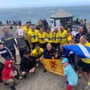 The Pilgrim Bandits with supporters in Land's End
