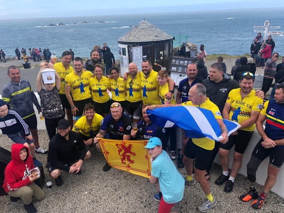 The Pilgrim Bandits with supporters in Land's End