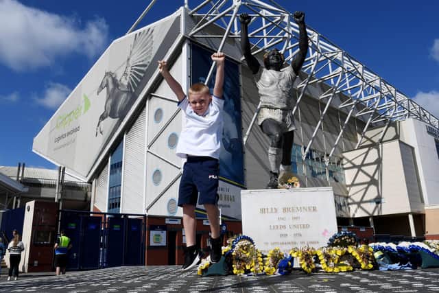 NEW GEAR - A young Leeds United fan celebrates securing the new home shirt at Elland Road. Pic: Simon Hulme