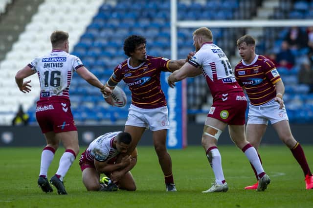 Huddersfield's James Gavet in action against Wigan earlier this season. Picture by Tony Johnson.