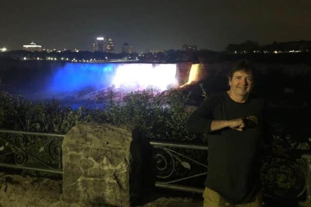 Kenny Donnison in front of Niagara Falls, which he helped make yellow, white and blue to celebrate Leeds United's promotion to the Premier League (all photos and video: Kenny Donnison).