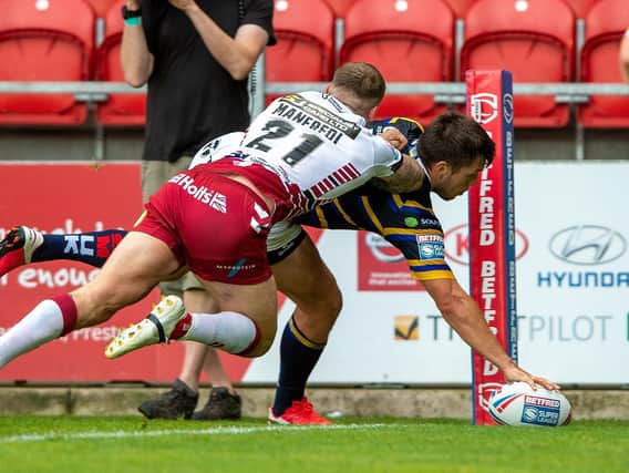 Tom Briscoe touches down against Wigan. Picture by Bruce Rollinson.