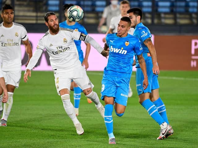AGREEMENT REACHED - Valencia have confirmed they have reached an agreement with Leeds United over the sale of Rodrigo, pictured in action against Real Madrid and Sergio Ramos. Pic: Getty