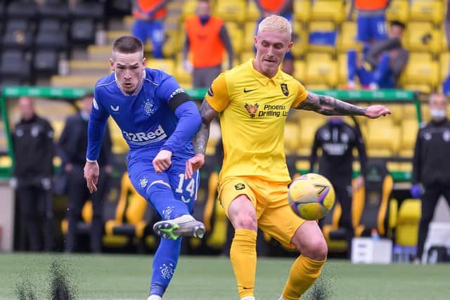 IN DEMAND: Rangers winger Ryan Kent, left, pictured being challenged by Livington's Craig Sibbald. Photo by Willie Vass/Pool via Getty Images.
