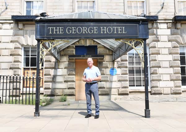 Great Britain and Castleford legend Malcolm Reilly pictured in front of The George Hotel in Huddersfield where the game of rugby league was born 125 years ago this Saturday. Simon Wilkinson/SWpix.com.