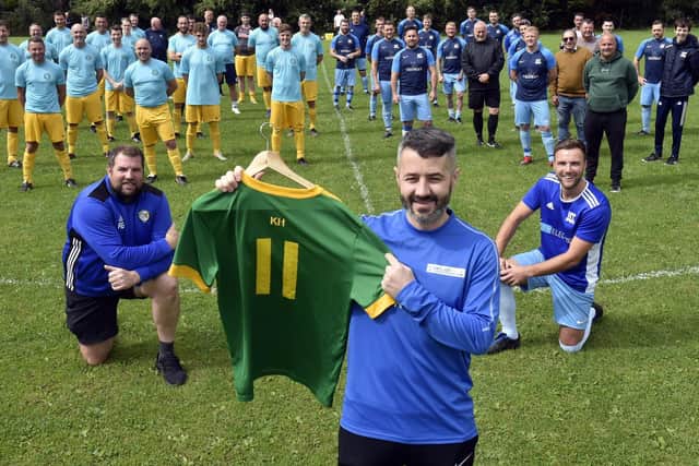 Paul McMullen, centre, with his No 11 shirt pictured with Main Line Social and HT Sports at the charity fundraising match (Photo: Steve Riding)