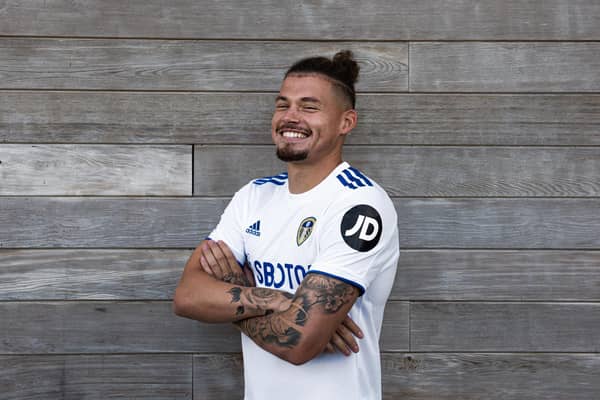 ALL SMILES: Midfielder Kalvin Phillips models the new Adidas Leeds United home shirt complete with JD logo on the sleeve. Picture by JD.
