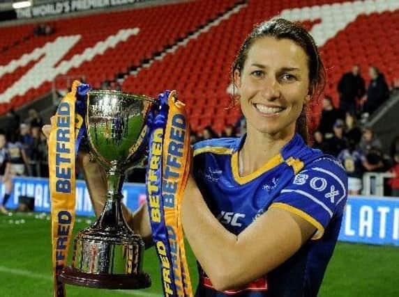 Rhinos' Courtney Hill with the Women's Super League trophy. Picture by Steve Riding.