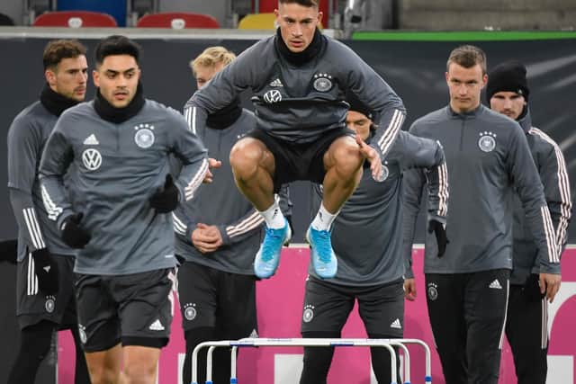 RELAXED: Leeds United target Robin Koch, centre, who has bagged another Germany national call. Photo by INA FASSBENDER/AFP via Getty Images.