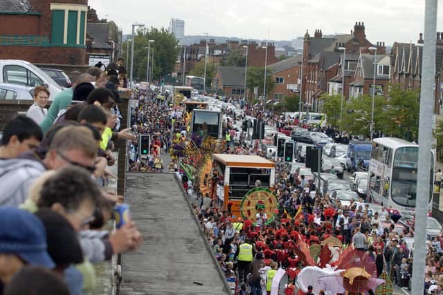 Leeds West Indian Carnival dancers making their way along Roundhay Road, Harehills in 2010. Picture by James Hardisty.