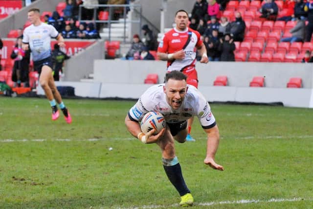 Rhinos captain Luke Gale scores during the win at Salford in February. Picture by Steve Riding.