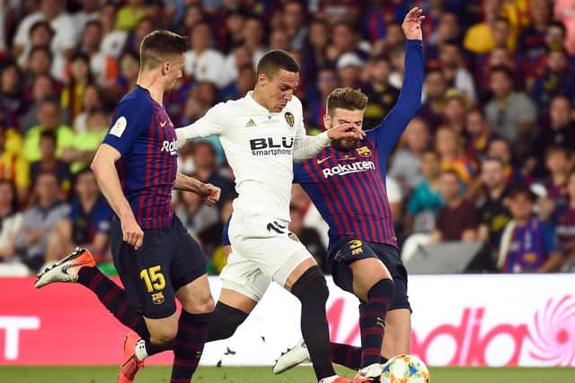 NEW BOY - Rodrigo, pictured here in action for Valencia against Barcelona, is Leeds United's record transfer signing. Pic: Getty