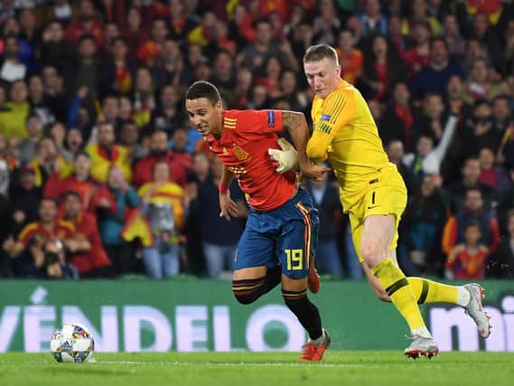BIG GAME - Rodrigo has plenty of top level experience with Valencia and with the Spanish national team. Here he's competing for the ball with England keeper Jordan Pickford in a Nations League fixture. Pic: Getty