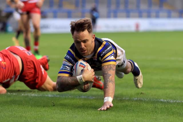 Leeds Rhinos' Richard Myler goes in to score against Salford Red Devils yesterday. Picture: Mike Egerton/PA Wire.
