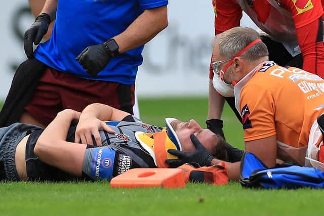 Castleford Tigers' James Clare needed hospital treatment for a neck injury following a tackle in the defeat to Wigan, but was later given the all-clear. Picture: Mike Egerton/PA Wire.