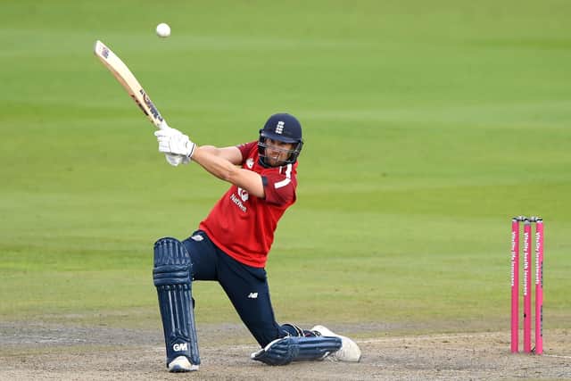 England's Dawid Malan strikes the ball for six against Pakistan at Old Trafford.