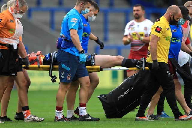 James Clare is taken from the field on a stretcher. Picture by Mike Egerton/PS Wire.