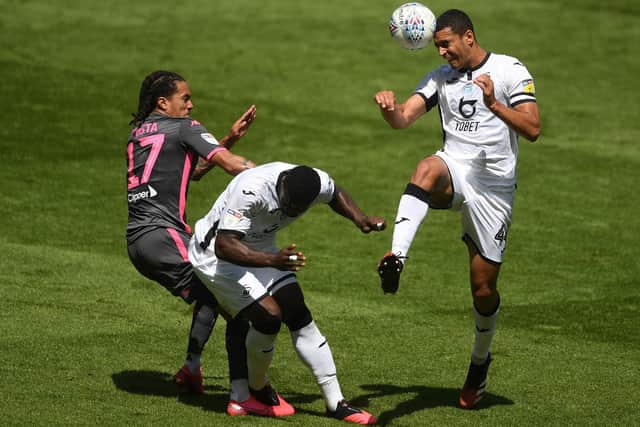 ON THE LIST - Ben Cabango, seen here winning a header against Leeds United last season, is a player director of football Victor Orta admires. Pic: Getty
