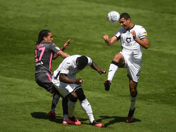 ON THE LIST - Ben Cabango, seen here winning a header against Leeds United last season, is a player director of football Victor Orta admires. Pic: Getty