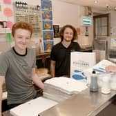 Mark Savage (right) pictured with sons Oliver, 14, and Joseph, 21, at The Village Fish Shop in Shadwell.
Photo: Gary Longbottom