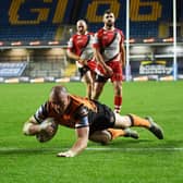 Grant Millington scores Tigers' winning try against Salford. Picture by Jonathan Gawthorpe.